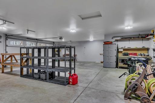 Excellent storage space and/or working areas in the back half of the garage!
