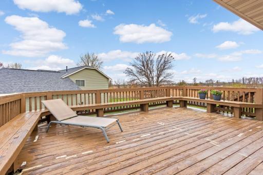 Large deck is perfect for entertaining. Side area for grills, too!