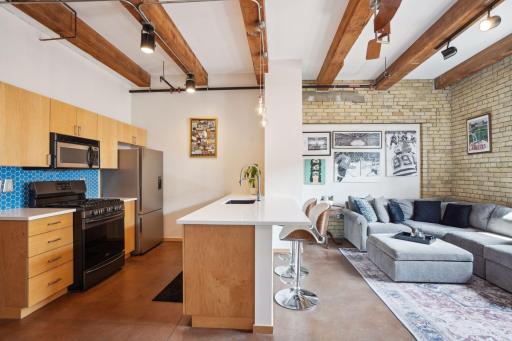 Awesome loft for entertaining as the kitchen flows seamlessly into the living space