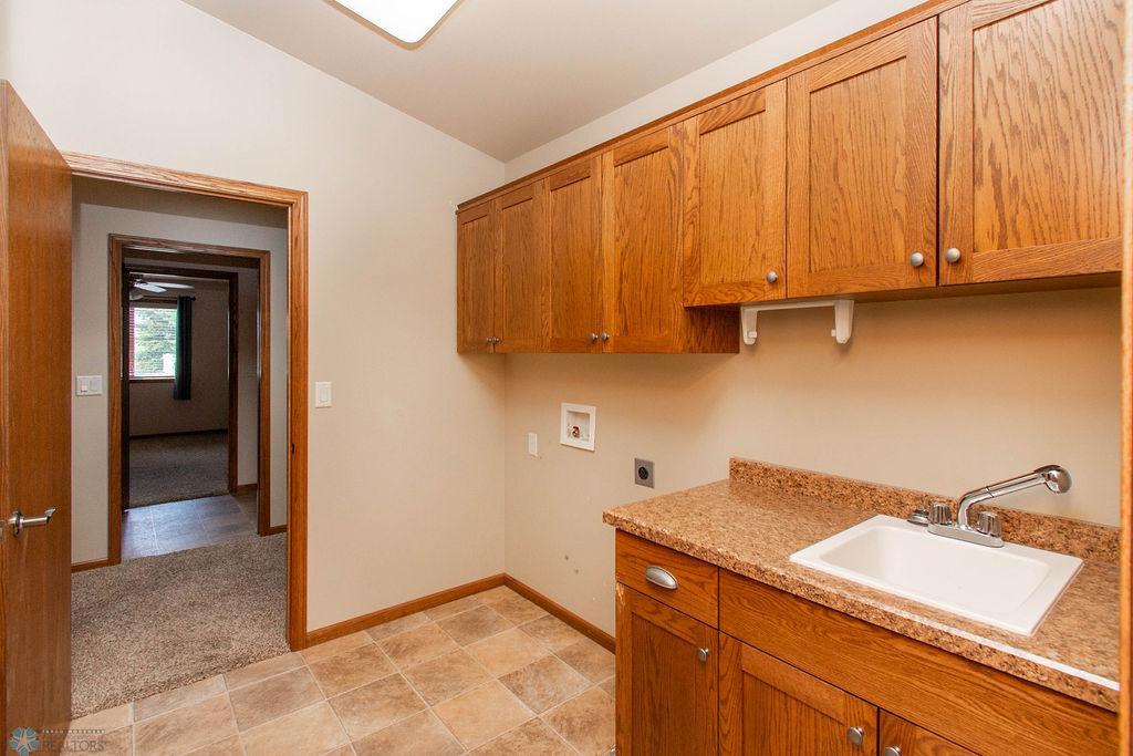 Main Floor Laundry Room-connected to primary bedroom closet