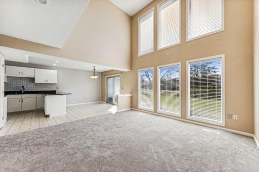 Great open layout and flow between living, kitchen, and dining areas - perfect for entertaining. The new carpet throughout the living room, bedrooms and loft make it a move right in feeling.