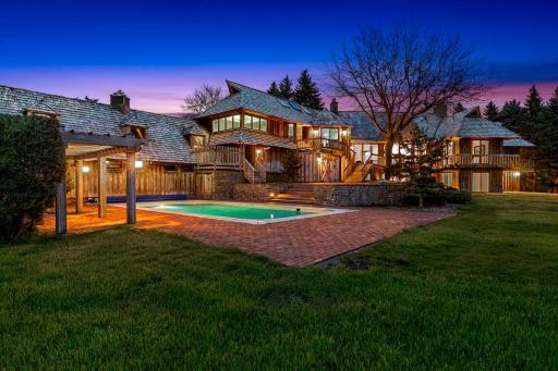 Experience a quiet, exceptional lifestyle at this stunning, Humphrey & Hardenbergh designed estate in the countryside, just 12 minutes west of 494, in Orono Schools.