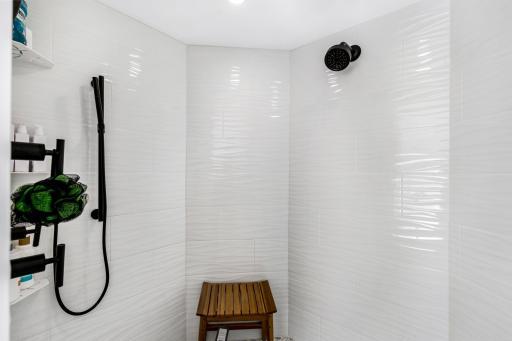 The large primary bathroom is completely updated with heated floors, a heated towel rack, an eco-friendly combination bidets/toilet with heated seat, a spacious, walk-in shower and luxurious soaking tub.