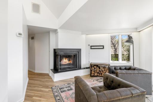 There is a generous sitting room within the spacious primary suite.