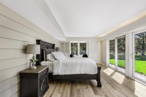 The second of 3 lower level bedrooms features tons of windows and plenty of space.