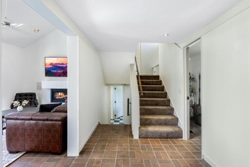 On the upper level you will find a large primary suite and office space.