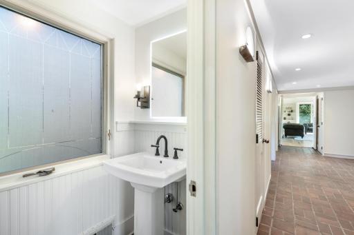 The main floor is serviced by a half bathroom.