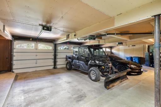 The attached 4-car garage is accessible from both the front and back of the home.