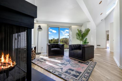 There is a generous sitting room within the spacious primary suite.