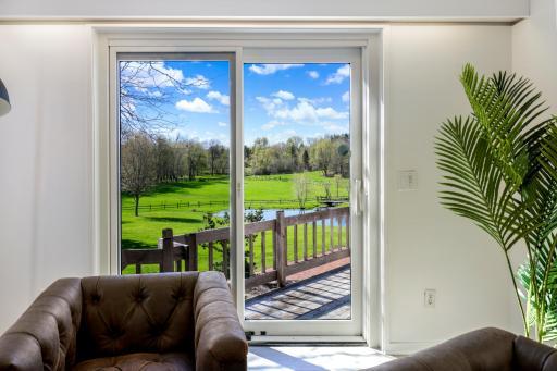 There is a generous sitting room within the spacious primary suite.