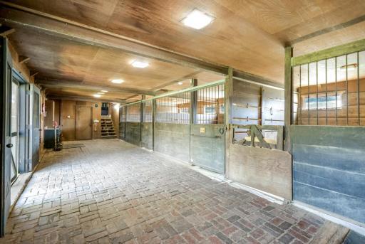 The four stall horse stable with above hayloft.