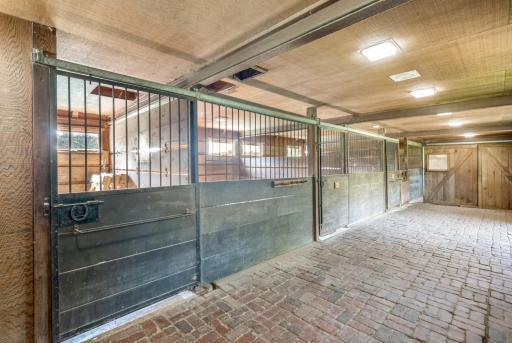 The four stall horse stable with above hayloft.