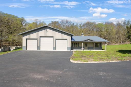 The Morton building offers both cold storage and a heated workshop with bathroom.