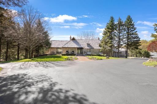 The paved area in front of the home and Morton building offers plenty of parking for guests.