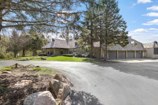 The paved area in front of the home and Morton building offers plenty of parking for guests.