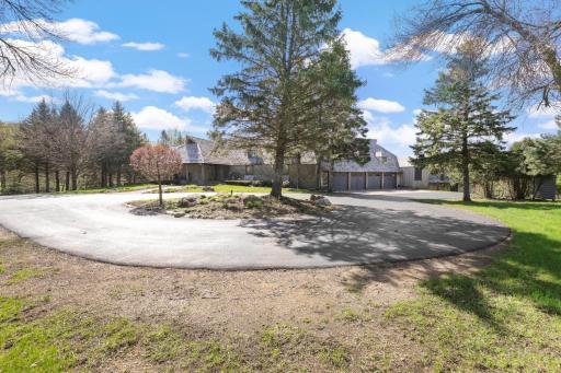 The paved area in front of the home and Morton building offers plenty of parking for guests.