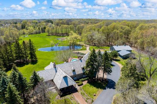 Built of durable, timeless, fine redwood lumber, the home was built to last and carefully positioned to place walls of windows along the southern exposure, pouring in natural light and astonishing views of the vast estate.
