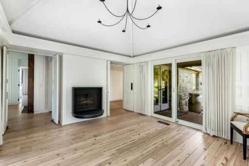 The front room is filled with natural light and can be used as additional living space or an office.