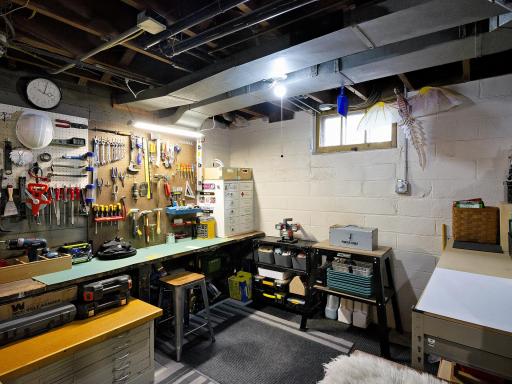 Great work area for woodworking or craft area. Window brings in the natural light.