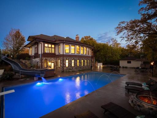 Poolside evening oasis. Note the poolside fire-pit, ready to light for an evening swim under the stars and moon.