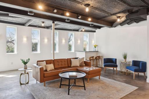 The lower level with high ceilings, heated floors, and direct access to the pool bring modern conveniences to this historic home. Nothing has been left to improve in this space.