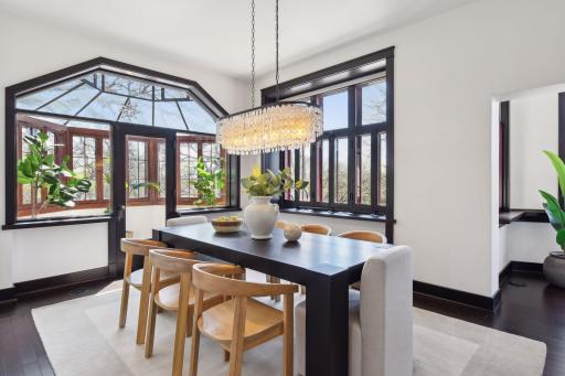 Light-filled dining room leads to the solarium and living-room. Electronic blinds throughout.