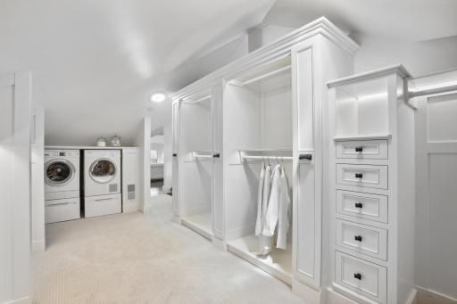 ... and of course primary suite laundry with heated floors. Second full size laundry in the lower level, convenient to the pool for towels and large home items.