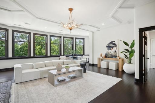 In-floor heat throughout with hardwood floors and a desirable contrast from white walls and dark wood trim.