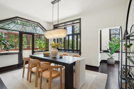 Light-filled dining room leads to the solarium and living-room. Electronic blinds throughout.