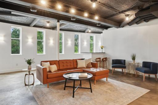 The lower level with high ceilings, heated floors, and direct access to the pool bring modern conveniences to this historic home. Nothing has been left to improve in this space.