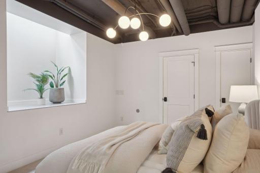 Deep window well provides natural light and a beautiful ambiance.