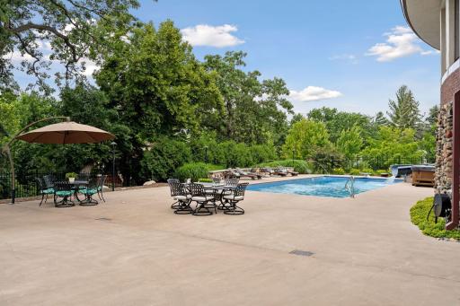 Ample room for outdoor grilling, dining, pick up basketball game and enough room for a ping pong table.