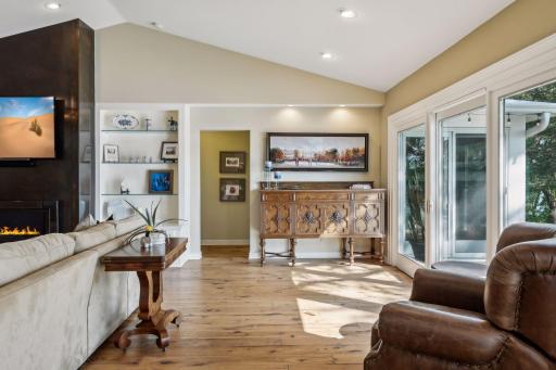 Hand-scraped hickory floors throughout main level