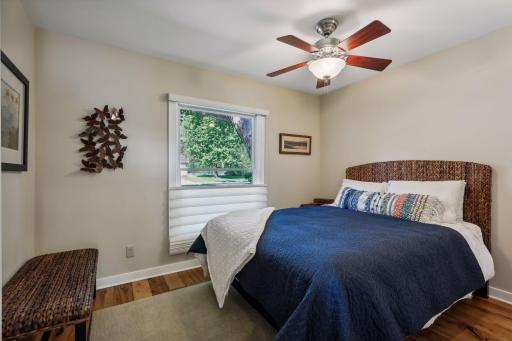 Here is the 2nd bedroom on the main level. You'll find Hunter Douglas Silhouette blinds in many rooms.