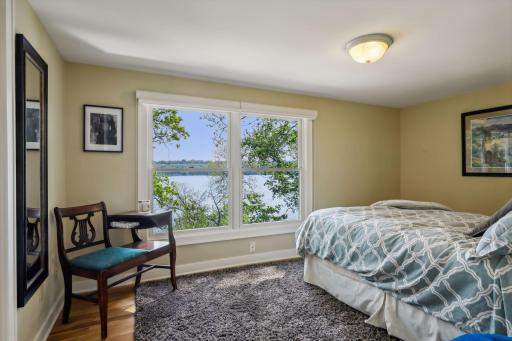 Two more bedrooms are located on the upper level.