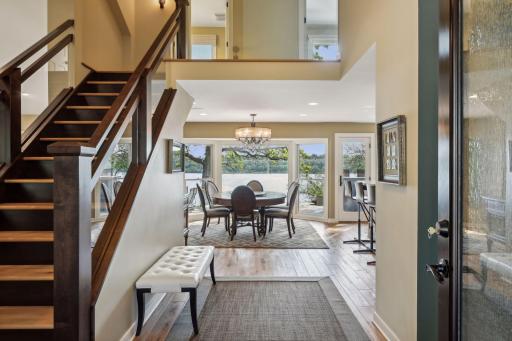 The walls of glass open the 2nd story to the main level