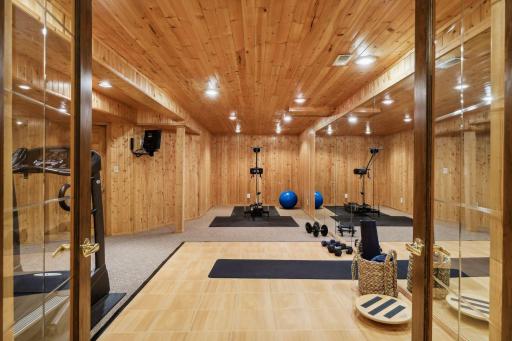 The spacious home gym is just off the family room. Custom flooring is included.