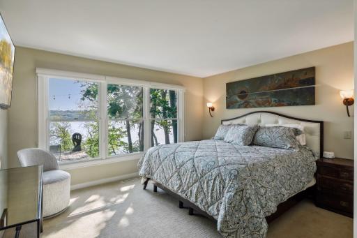 Primary bedroom with stunning views of the River