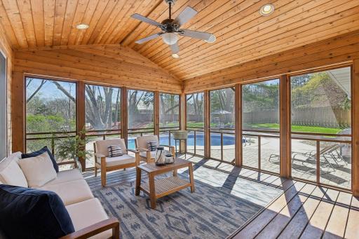 Inviting screen porch perfectly merges the indoor spaces to the out.