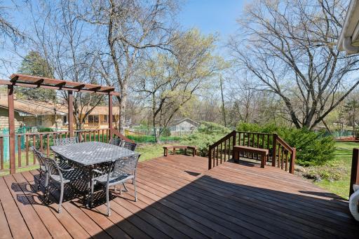 Multi-tiered, ironwood deck offers multiple seating options