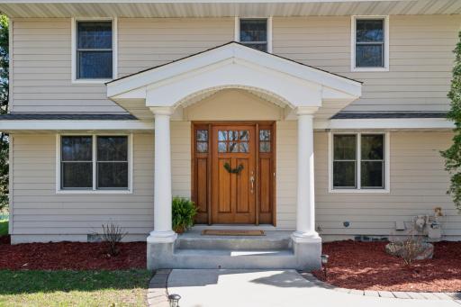 Welcoming curb-appeal greets you as you approach this beautifully maintained home.