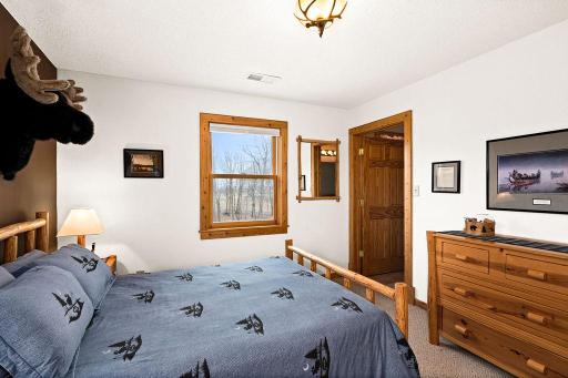 The pine room features an en-suite, full bath.
