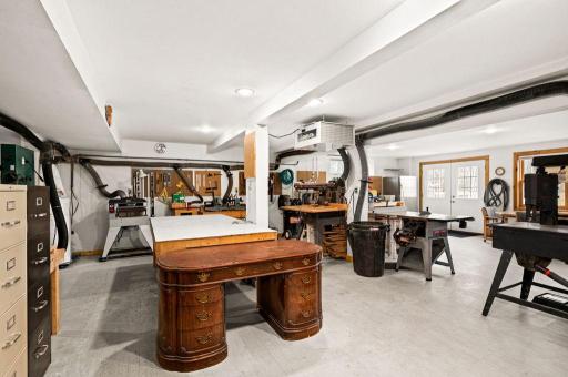 This shop is currently being used as a fully operational wood shop, but could be converted into it's own apartment suite or a future bridal suite some day.