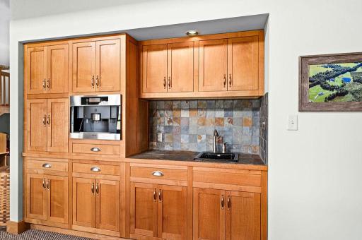 Custom, built in executive coffee/wet bar for your guests, with a built in Miele coffee system with 10 programmable profiles.