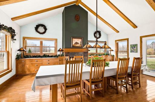 This beautiful dining room features 14' vaulted ceilings.