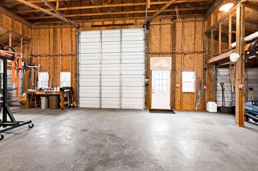 The building has two large 14' garage doors, controlled by jack post openers.