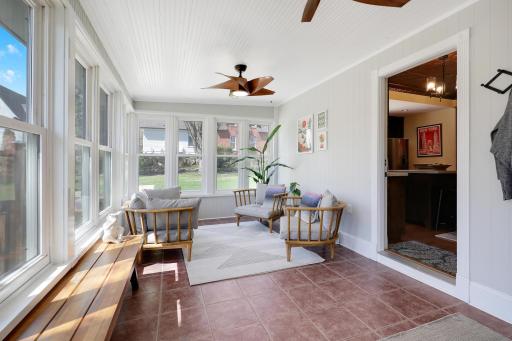 South facing Back porch/Mudroom area with newer windows and Baseboard heat. Delightful porch fans!