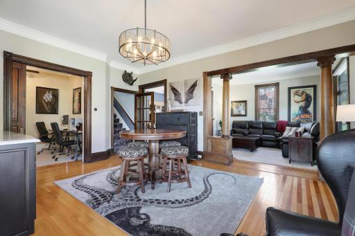 1800's charm not to be overlooked. Millwork details oozing in every room, over-size pocket doors, large baseboards, crown molding, built-ins, beautiful hardwood floors