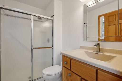The primary suite features its own private 3/4 bathroom.