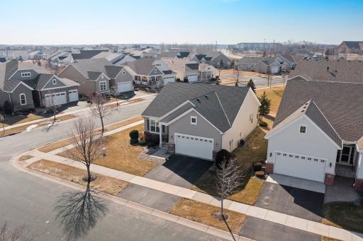 Located on a corner lot in a lively 55+ neighborhood. Only blocks from Rush Creek Golf Club, Shamrock Golf Course, Weaver Lake Community Park, HyVee Grocery, access to I-94 & 494, Highway 55, plus so much more!